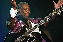 BB King playing guitar
